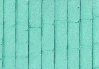 Turquoise copper wall cladding creating modern architectural design