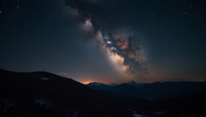 Celestial Symphony: The Milky Way gracefully arcs across the night sky, painting a breathtaking panorama above the tranquil mountainscape.