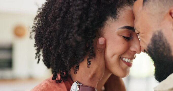 Happy couple, face and love with affection, support or care in embrace, romance or forehead at home. Closeup of man and woman with smile or touch for healthy relationship, bonding or romantic moment