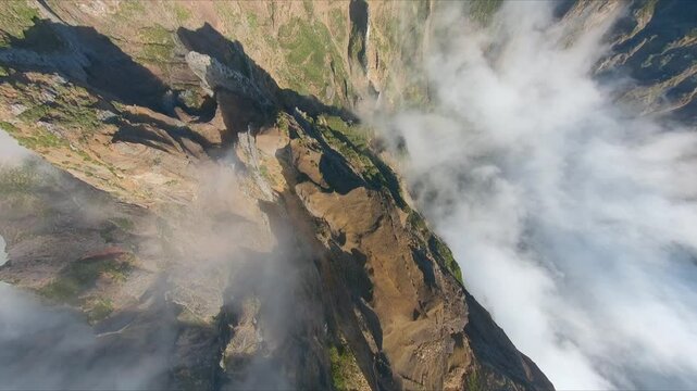 Pico ruivo and pico arieiro on madeira's pr1 trail captured by fpv drone, aerial view