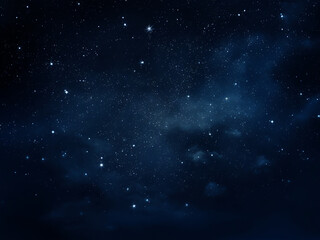 Fototapeta premium Dark blue to black midnight sky speckled with stars illuminating the night