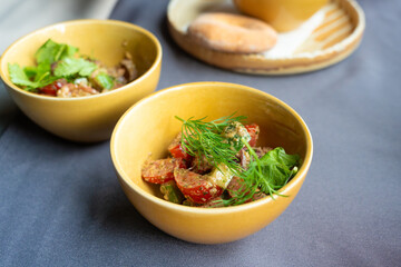Georgian salad of fresh vegetables with nut dressing. Traditional glekhurad salat