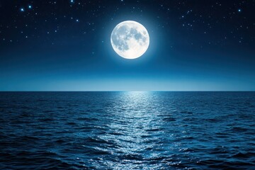 Full moon shines brightly over a dark ocean reflecting light on the water.