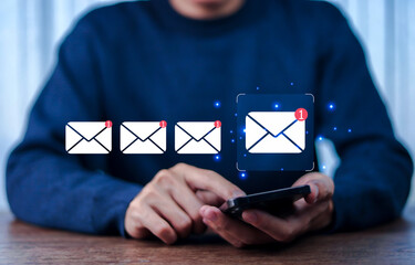 Businessman touching email on virtual screen. New email notification concept for business email...