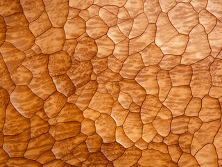 Quilted maple veneer with a bubble pattern and prominent grain creating a luxurious surface