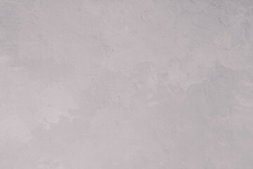 Textured gray concrete plaster wall with subtle rough surface for background or design use