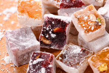 Sweet food Turkish delight, assorted rahat locum in form of cubes with nuts and powdered sugar, traditional food