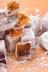 Sweet food Turkish delight, assorted rahat locum in form of cubes with nuts and powdered sugar, traditional food