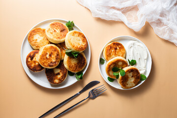 Homemade cottage cheese pancakes with sauce 