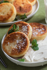 Homemade cottage cheese pancakes with sauce 