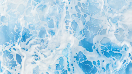 The image is of a blue ocean with white foam. The foam is scattered throughout the ocean, creating a sense of movement and energy. The blue color of the ocean
