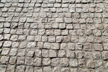 View of the pavement made of irregularly shaped stones, texture backgrounds for graphic design....