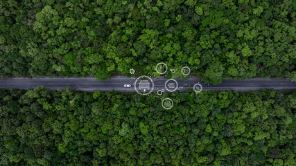Electric car drive through green forest road, Electric car in middle green forest road and green tree forest, Electric vehicle car eco natural forest tree environment friendly road, Sustainable energy