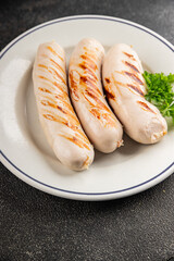 White sausage grill Bockwurst pork meat Bratwurst natural food vegetables dish organic product fresh tasty gourmet food background on the table rustic food top view copy space