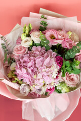 Flowers lisicodon grandiflorum and hydrangea on a pink background