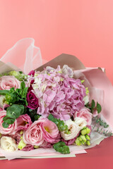 Flowers lisicodon grandiflorum and hydrangea on a pink background