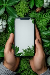 Innovative smartphone mockup amidst lush greenery showcases modern technology intertwined with nature, perfect for marketing campaigns focusing on eco-friendly themes