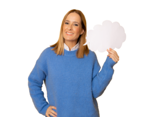 Young smiling woman in winter clothing showing paper cloud space isolated over transparent background. PNG transparent