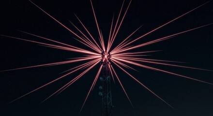 Obraz premium A dramatic night scene featuring a radio tower emitting bright, star-like light streaks against a dark sky.
