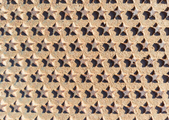 Rusty Metal Surface with Star Pattern