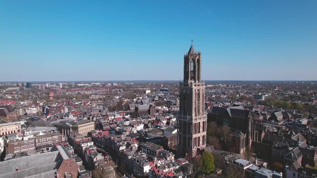 Aerial of typical Dutch city skyline, Utrecht cityscape with renovated Dom tower, canals and houses, Holland, Netherlands