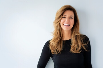 Fototapeta premium Confident businesswoman against white background