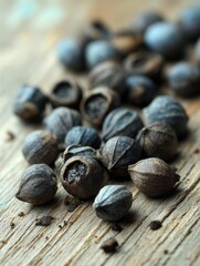 Obraz premium Close-up shot of capers on a rustic wooden surface, scattered naturally - preserved mediterranean tangy