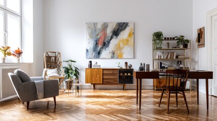 Modern living room with wooden floors, comfy armchair, and abstract art.