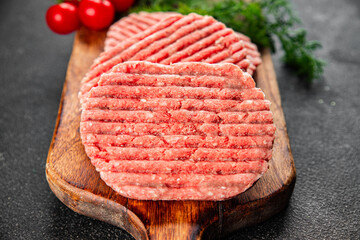 Meat cutlet raw pork beef meat dish organic fresh tasty gourmet food background on the table rustic...