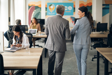 Professional Team Collaboration in Modern Office Environment with Colleagues