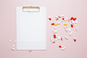 Blister of tablets and blank clipboard. Concept of medicine, healthcare, and pharmaceutical industry