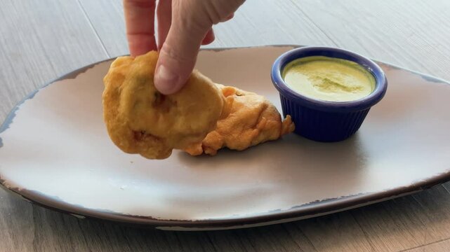 Eating a Plate of Indian Medu Vada