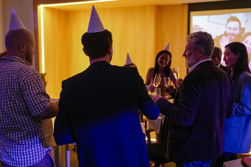 The work team organized a party to see off their senior colleague on his retirement. The concept of...