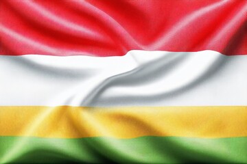 Fototapeta premium Hungarian flag waving gently in the wind during a bright sunny day