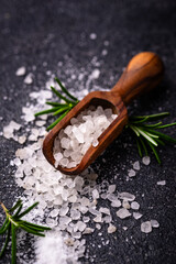 Natural sea salt crystals on dark background