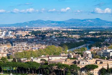 A cityscape view of the city of Rome, Italy as seen from the top of the Dome of St Peter's Basilica