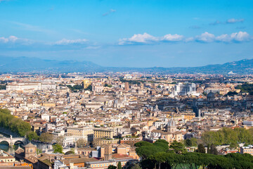 Obraz premium A cityscape view of the city of Rome, Italy as seen from the top of the Dome of St Peter's Basilica