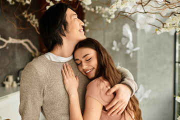 Couple joyfully prepares for their upcoming wedding surrounded by romantic decor and vibrant smiles