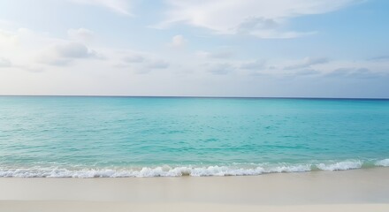 Serene Coastal Scene: Turquoise Waters and Soft Sand