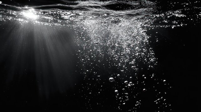 Close-Up Bubbles Fizzing Sparkling Soda Water in Black Background for Refreshing Drink Menus