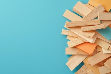 Assorted Wooden Blocks on Teal Background, Playful Composition for Arts and Crafts, Design Concepts