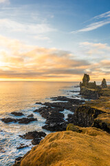 Volcanic cliffs of Londrangar over the Atlantic Ocean, Iceland