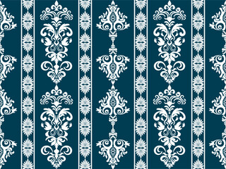 Elegant damask pattern in white on a rich teal background, showcasing intricate floral and ornamental designs for sophisticated decor.