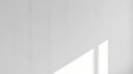 Geometric Window Shadow on Pale Interior Wall