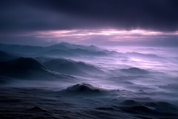 Fototapeta premium Misty mountain landscape at dawn with soft purple hues and rolling hills in serene nature