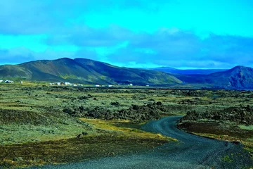 Fotobehang Turkoois Iceland-view of road and seacoast near Grindavík on the southern peninsula  © bikemp