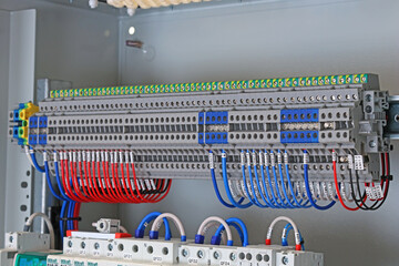 Electrical terminals with insulated wires connected in the electrical switchboard. 