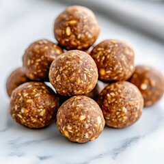 Delicious gluten-free protein bites on marble countertop closeup view highlighting crunchiness natural light