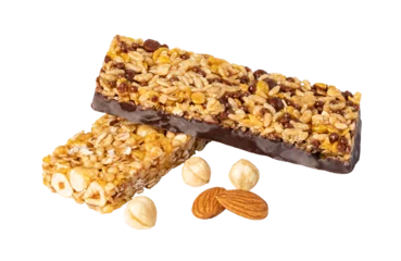 Gordijnen Two cereal bars with chocolate, almonds and hazelnuts falling on transparent background © Gresei
