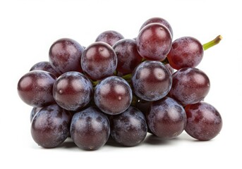 Close up view of a bunch of ripe dark red grapes isolated against a plain white background studio shot